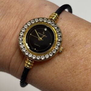 Peugeot Quartz Black Gold Rhinestone Twisted Cable Bracelet Dress Watch